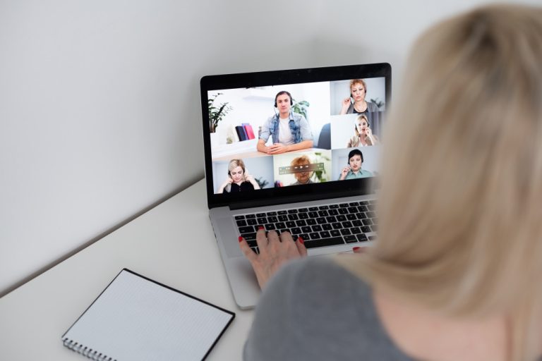 woman attending online meeting