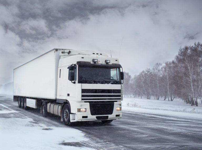 truck on the road during winter