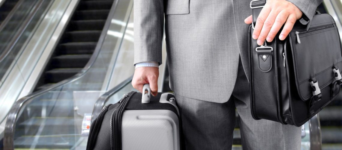 businessman carrying his luggage